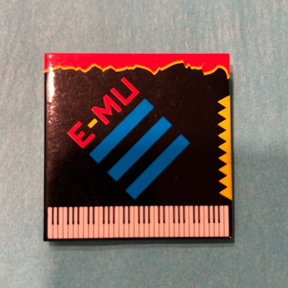 E- MU vintage pin
